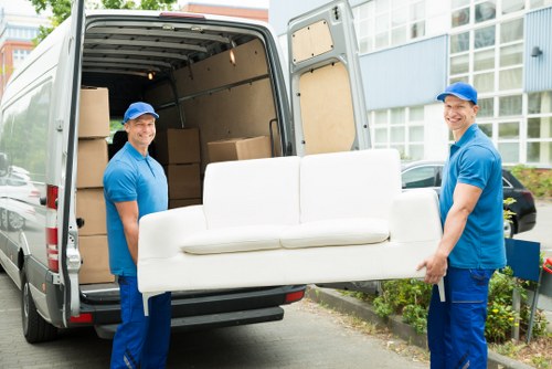 Van loading recyclable household items for a sustainable Brentford move