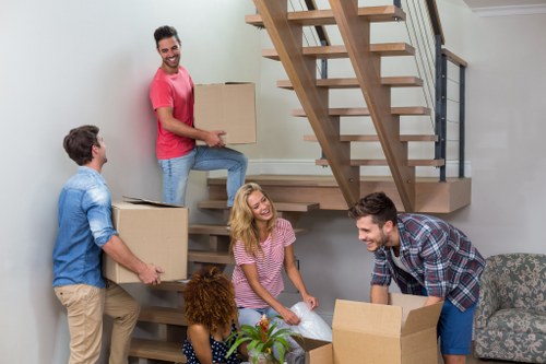 Moving van with boxes outside a Brentford property