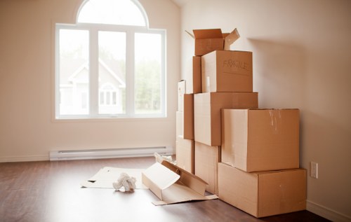 Professional Brentford movers packing household items carefully