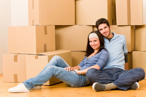 Neatly packed boxes and furniture in Brentford storage unit