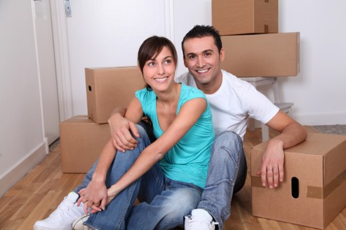 Professional movers handling student belongings in Brentford
