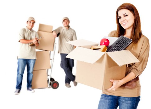 Packing boxes and furniture for a home move in Brentford