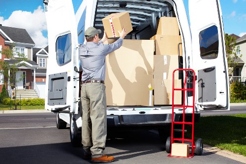 Driver and mover finishing a safe loading procedure with secured cargo