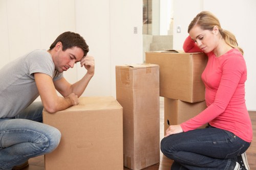 Trained movers using safe lifting techniques
