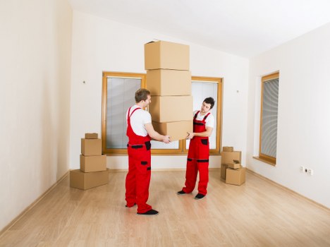 House move preparation in Brentford with labeled boxes and furniture protection