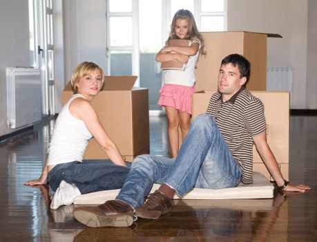 Furniture and boxes being moved for a Brentford flat relocation